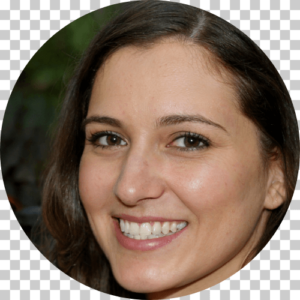 Woman with brown hair smiling at the camera.